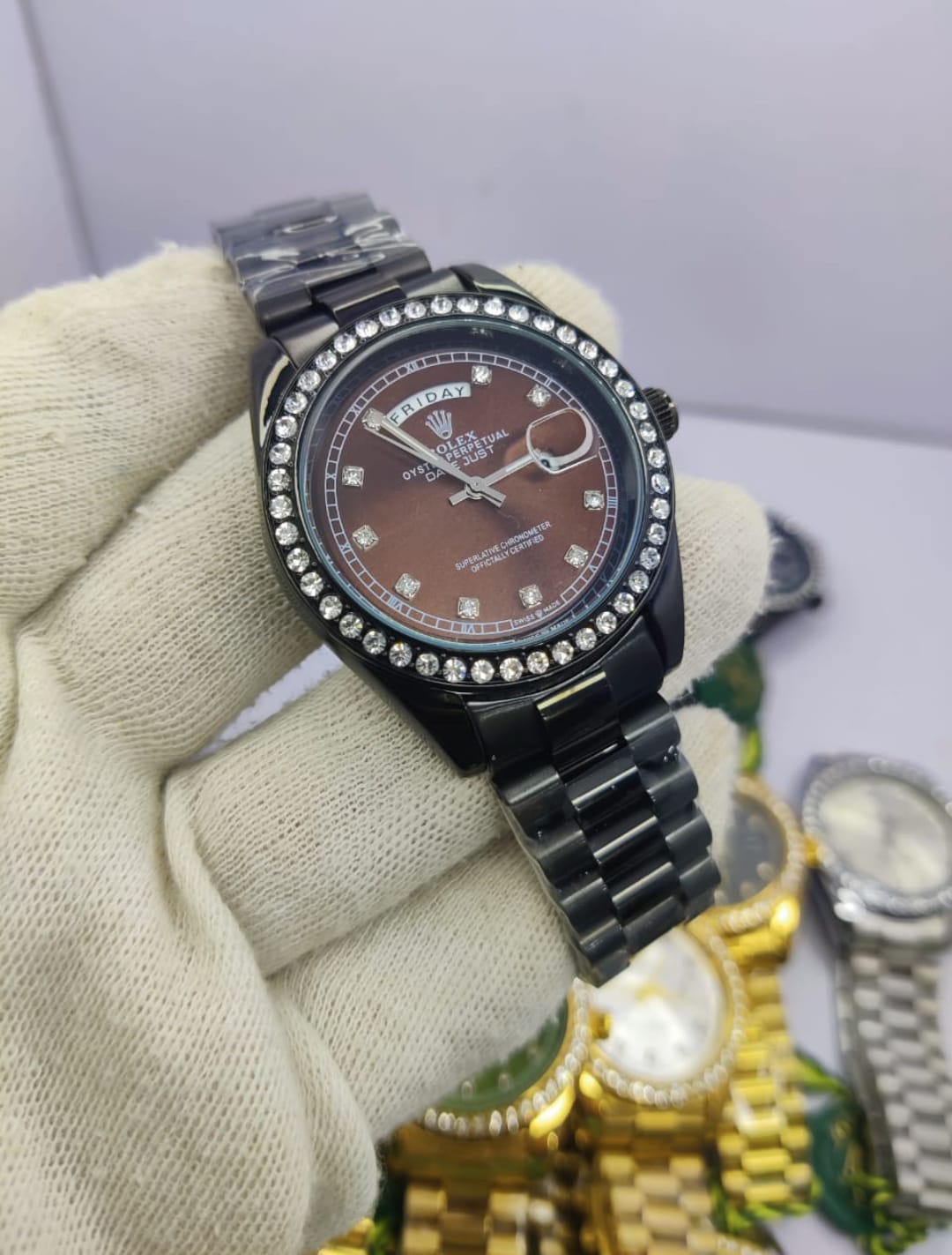 Rolex All Black Diamond-Cut Stone men’s watch with brown dial