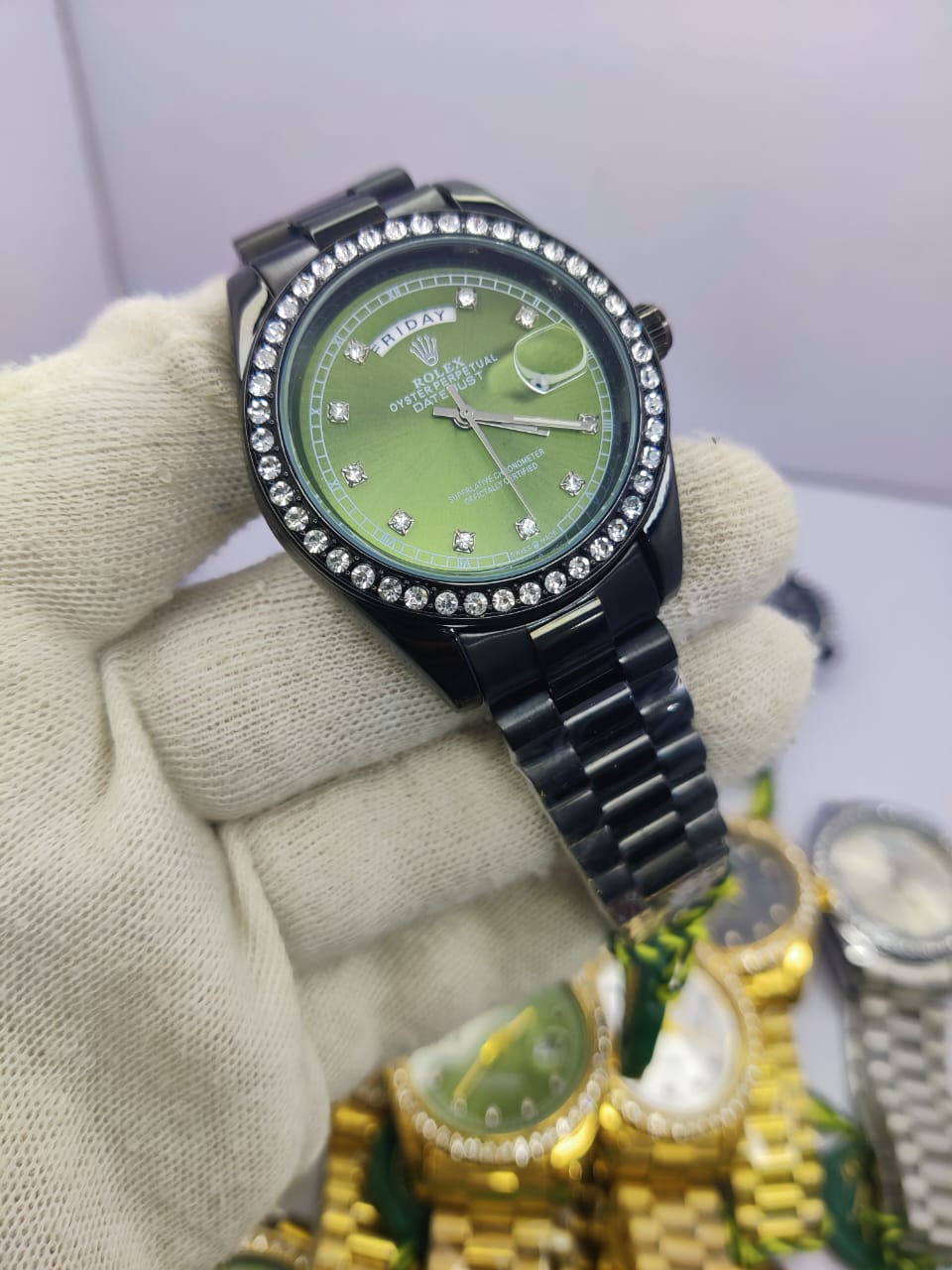 Rolex All Black Diamond-Cut Stone men’s watch with light green dial