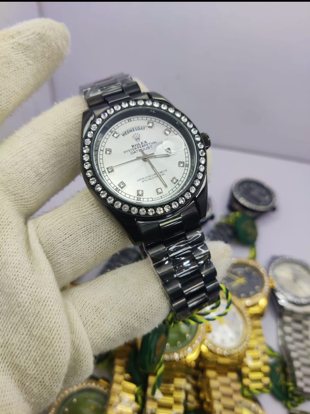 Rolex All Black Diamond-Cut Stone men’s watch with white dial